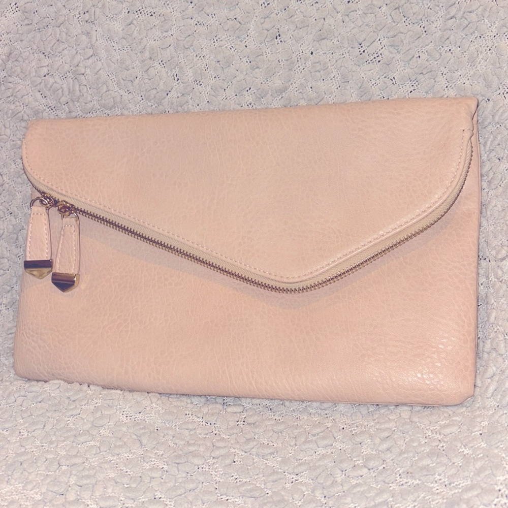 Large light pink trendy envelope clutch, brass embellishments, great condition.